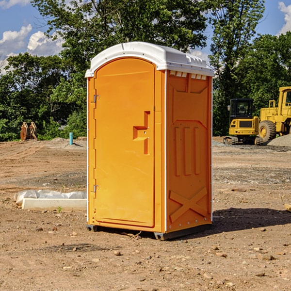 what is the cost difference between standard and deluxe portable toilet rentals in Clements